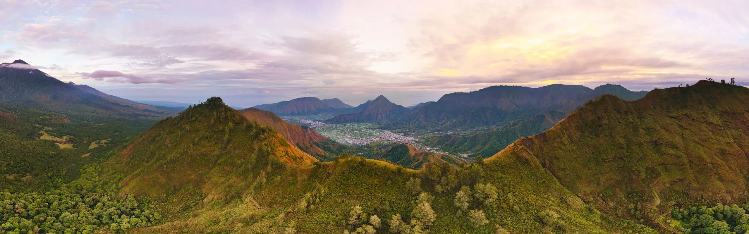 Aerial view of the Sembalun valley, Lombok, Indonesia — base region for Venture Beyond Expeditions school group treks